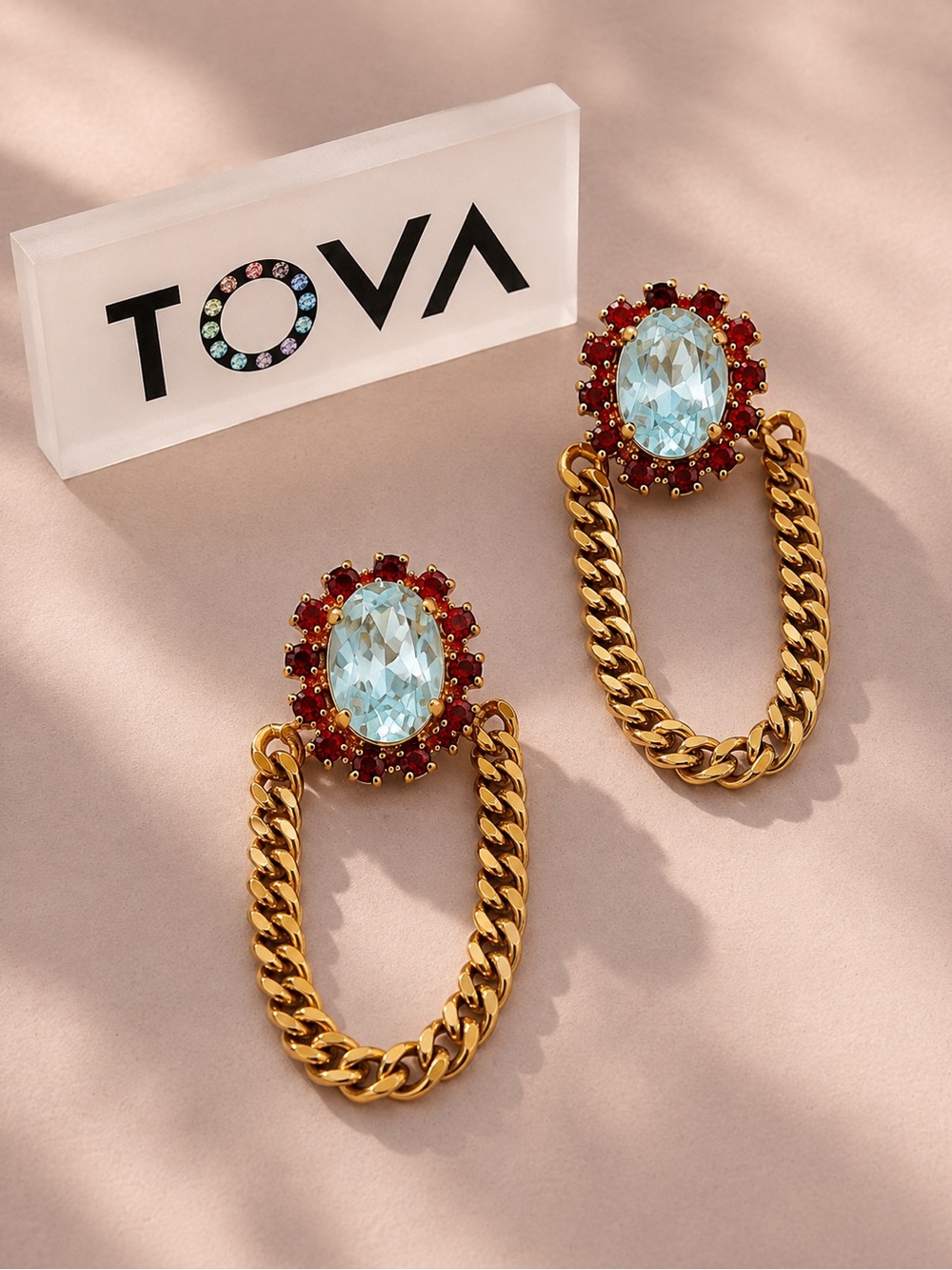 TOVA Abbey earrings in red and aqua crystals
On a gold chain drop